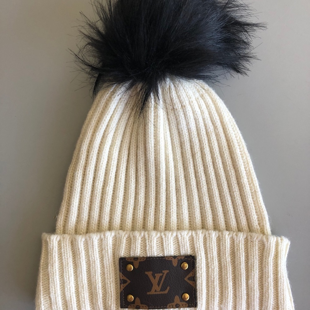 Cream beanie W/black Pom Pom